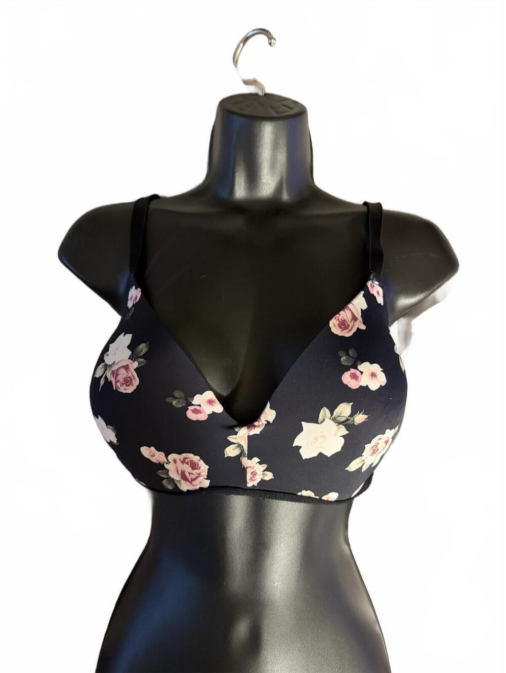 BRA BY PINK IN BLACK  AND FLORALSIZE 34DD HAS NO WIRE